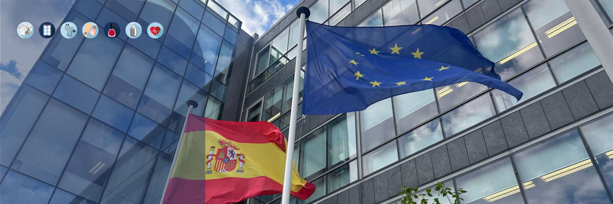 Imagen de la portada de la Memoria, con la sede de la AEMPS, y la bandera española y europea